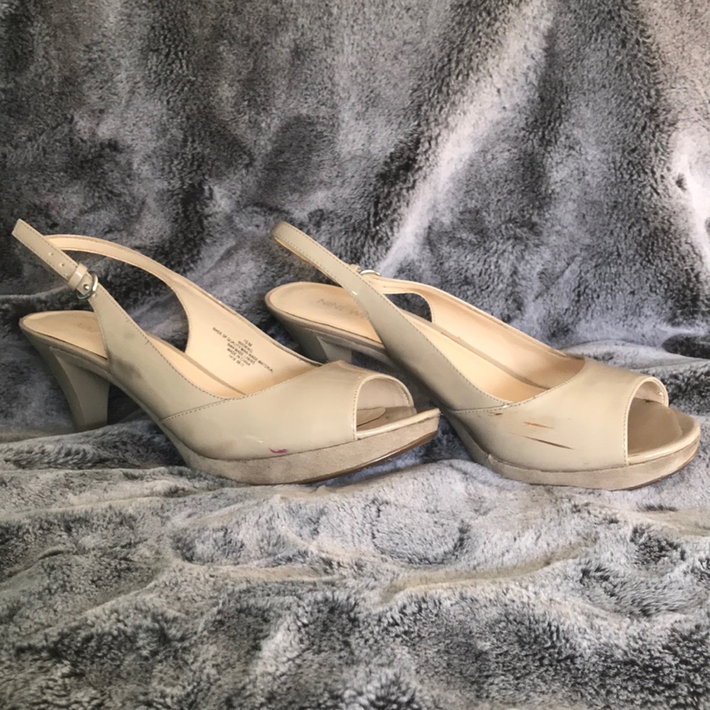 Open-toe, strap back heels.